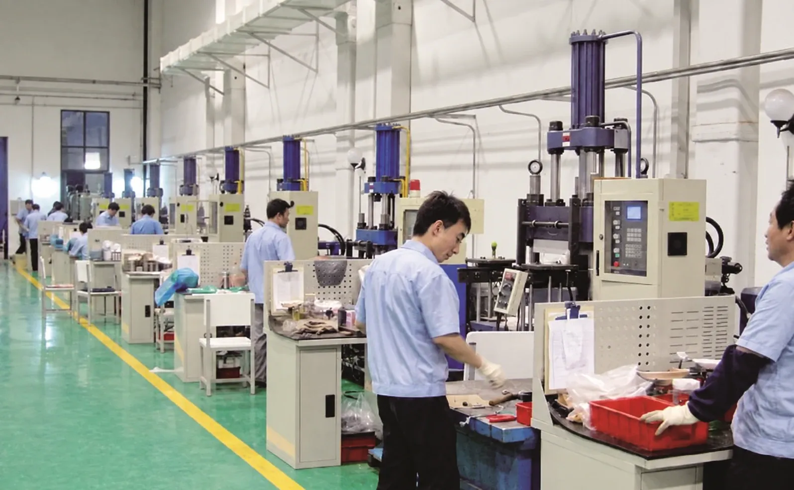 Insulator moulding workshop with moulding presses